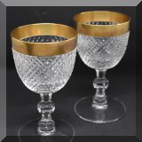 G08. Pair of gold rimmed glasses. 